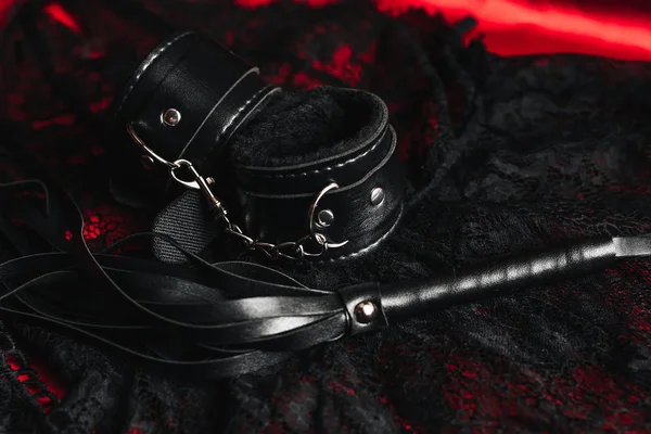 Depositphotos 268531948 Stock Photo Handcuffs And A Whip With